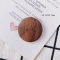 Close-up of a 34.5mm round walnut wood geometric pendant with natural wood grain - Round Walnut Wood Pendant (6#)