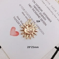 Detailed view of a 28x25mm sun and moon gold plated pendant for DIY jewelry making - Personified Sun Moon Combined Style (KP3108)