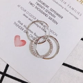 Macro detail of silver-plated three-piece stackable rings with sparkling zircon accents - Silver Pave Circle Set Style (3#)