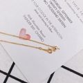 Detail of adjustable gold O-chain bracelet with slider bead and spring clasp closure - Cable Chain / Gold