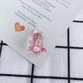 Macro shot of pink aurora acrylic bear pendant with iridescent finish for DIY jewelry - Gradient Pink
