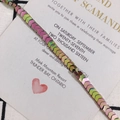 Detailed shot of chevron arrow link bracelet with iridescent rainbow metallic finish - String (Approx 114 Units) / Green Pink
