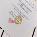 Close-up of teardrop resin pendant with dried yellow flowers and gold metal trim - Yellow Dried Flower (1#)