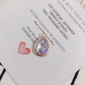 Macro detail of teardrop resin pendant with purple flowers and gold plated edges - Purple Glitter (3#)