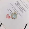 Detailed view of teardrop pendant with gold copper edging and blue dried flowers - Light Blue Dried Flower (4#)