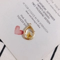 Detailed view of teardrop pendant with yellow dried flower in gold frame - Small Yellow Dried Flower (5#)