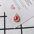 Detailed view of teardrop copper pendant with red dried flowers and golden edges - Red Dried Flower (11#)