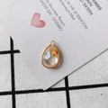 Macro shot of waterdrop resin pendant with orange dried flower and gold metal edging - Orange Dried Flower (13#)