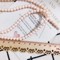 Matte finish peach round beads with diameter reference on a wooden ruler for DIY crafts - 6mm / Candy Color Bead (KP2917-3) / Peach Pink