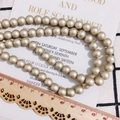 Perline rotonde da 8mm in oro champagne opaco per creazione di gioielli e accessori fai da te - 8mm / Perlina Color Caramello (KP2917-8) / Oro Metallizzato