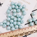 Perline rotonde azzurre da 10mm con finitura lucida e foro centrale per gioielli DIY - 12mm / Perlina Color Caramello (KP2917-4) / Azzurro
