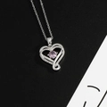 Heart-shaped pendant necklace in silver with round pink birthstone and zircons - Dark Purple (February)
