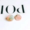 Macro detail of marbled resin hoop earrings with steel posts and elegant pink-green swirl - 21# (Pink Orange Light Green Marble)