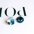 Macro shot of circular acetate earrings with blue marble texture on white display card - 23# (Deep Light Blue White Marble)