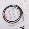 Collar de cordón trenzado marrón ajustable con cierre de mosquetón plateado y cadena - 2mm / Café Oscuro