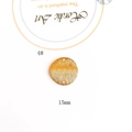 Macro view of a 15mm gold-plated brushed metal round pendant with double holes for DIY - 15mm Double Hole Round Style (4#)