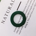 Detail view of dark green wooden geometric circle pendant for DIY earring crafting - Green