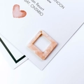 Macro view of peach pink square acetate hollow pendant with marble texture for DIY jewelry - Peach Pink Marble