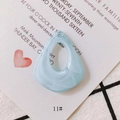 Macro detail of light blue resin drop earring with textured wavy surface on grid pattern - Light Blue Wave Pattern (11#)