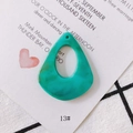Macro shot of geometric resin teardrop pendant with teal marble texture and pre-drilled hole - Teal Marble Pattern (13#)