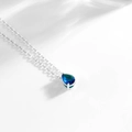 Elegante collana in acciaio inossidabile con ciondolo in pietra blu a taglio a pera - Argento-Dicembre