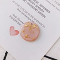 Macro shot of pink acrylic round pendant with embedded gold flakes for DIY jewelry - Round Gold Foil Pendant (KP2625) / Pink