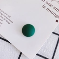 Detail view of dark green matte resin semi-round bead for DIY crafts and jewelry - Dark Green