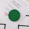 Detail of round green resin charm with woven texture for DIY jewelry making - Green