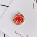 Ethnic circular flower charm with gold frame and red silk thread woven floral pattern - Red