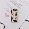 Close-up of golden alloy rectangular leopard print hollow charm for jewelry making - Grey White Leopard (1#)