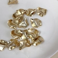 Light gold petal-shaped metal pendant with smooth wave texture and top hole for DIY jewelry - Gold