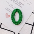 Grüner ovaler Acrylanhänger in Rattan-Optik mit Flechttextur für DIY-Schmuck - Grün