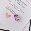 Macro detail of gradient crystal rectangle pendant with gold setting and top loop - Phantom Purple
