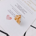 Irregular geometric matte mustard yellow stud earring with silver needle on paper card - Brown
