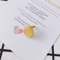 Detail of yellow geometric irregular round stud earring with a matte painted finish - Yellow