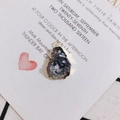 Detail of irregular teardrop resin pendant with shimmery stone texture and gold plated rim - 6# Black Purple