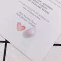 Macro shot of a tear-drop shaped lilac faux pearl bead for DIY jewelry making - Light Purple