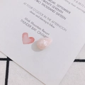 Close-up of pink teardrop faux pearl bead with marble texture for DIY jewelry making - Pink Cloud