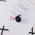 Minimalist matte black round stud earrings featuring a sleek modern geometric design - Black