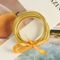 Goldenes Glitzer Armreif Set mit orangefarbener Satinschleife für stilvolle Damen - Dunkelgelb
