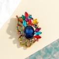 Golden vintage style brooch with large blue center stone and colorful crystals - Multi-color (YLXZ-0047-colors)