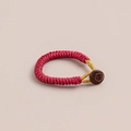 Handmade red braided ring with gold thread detail and dark brown button closure - 1 Piece / Dark Red