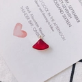 Close-up of a red fan-shaped gemstone pendant with gold-plated trim for DIY jewelry - Red