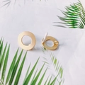Detailed macro of golden alloy round earrings with brushed matte finish on a leaf pattern - Hollow Round Style (4#)