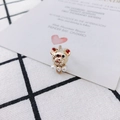 Macro shot of gold-plated teddy bear pendant with pearl accents for DIY jewelry making - Gold with Pearl