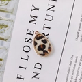 Detailopname van ovale luipaard hanger met gouden kralenrand voor DIY sieraden - Gember Panterprint (4#)
