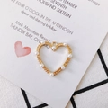 Golden heart-shaped alloy pendant accessory with eight white pearls and top ring - Gold - Hollow Heart