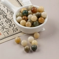 Mix van 10mm houten kralen in aardetinten in keramische kom voor DIY-sieraden maken - 1-stuks verpakking / Multi-variëteit Bodhi-zaden