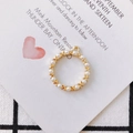 Golden alloy circular pendant with white pearls and integrated hanging loop for DIY jewelry - Gold Ring Cross