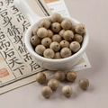 Natural light brown 10mm round wooden beads with wood grain in a white ceramic bowl - 1 Piece Pack / Camphor Wood